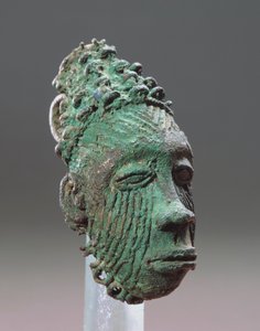 Ihmisen päätä esittävä riipus, Igbo-Ukwu, 9.-10. vuosisata (lyijypronssi).